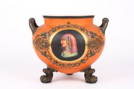 A Victorian jardiniere, of rounded form predominantly coloured orange with hand painted details of