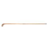 An early 20th century carved wooden ‘Sunday Stick’, formed in the shape of a golf club, with