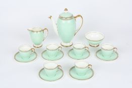 A Royal Doulton porcelain coffee service, Decorated in sage green with gilt highlights, comprising a