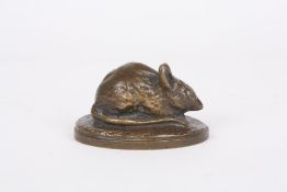 A 19th century bronze model of a mouse, seated upon an oval naturalistic base, unmarked. 8cm