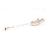 An Edwardian silver seal top spoon, hallmarked London 1908, with large circular bowl, straight