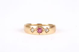 An 18ct gold, ruby and diamond gypsy ring, 4.9 grams. Size N ½ . Ruby appears to be chipped