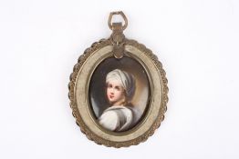 A 19th century porcelain miniature portrait, of oval form, the girl painted in white robes and