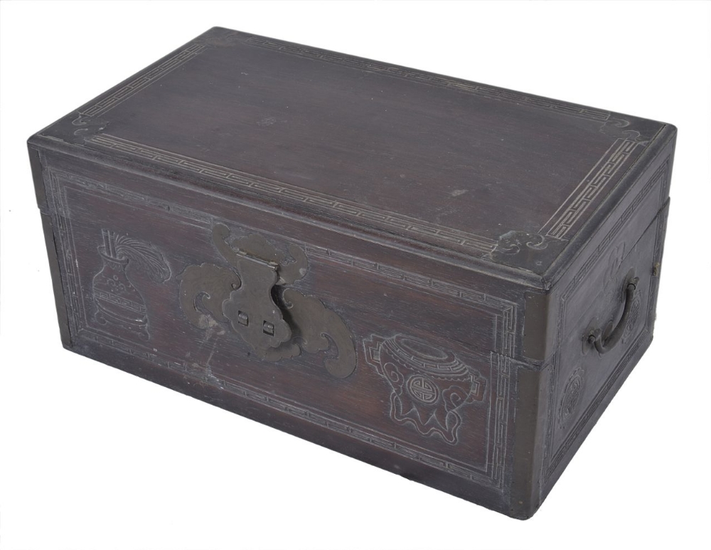 A small Chinese wooden chest, with all sides carved with images of urns, with brass lock, 42cm
