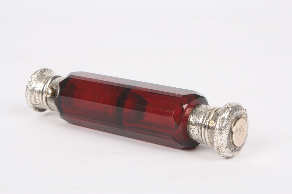 A Victorian double ended perfume bottle, the faceted cranberry coloured glass bottle with silver - Image 2 of 2