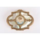 A ladies Regency mother-of-pearl and gilt metal trinket box, the lid with inlaid painted portrait on