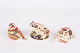 Three Royal Crown Derby paperweights, a tortoise, a seated frog and a bird, all decorated in the