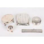 Five items of assorted silver, including a Birmingham silver cigarette case; an egg shape