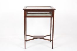 An Edwardian mahogany inlaid bijouterie table, with satinwood crossbanding and line inlay and