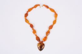 An amber necklace with heart shaped pendant, the Baltic amber necklace with angular shaped amber