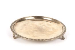 A silver gilt salver retailed by Harrods, hallmarked London 1937, and makers initials for Richard