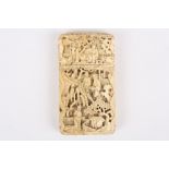 A miniature ivory Cantonese card case, the carved case depicting temples, figures and trees,