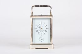 A Modern French repeating clock with alarm, by L’Epee, with Roman numerals, subsidiary dial, and