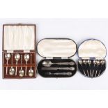 A set of six cased George V silver demi-tasse coffee spoons, hallmarked Sheffield 1929 together with