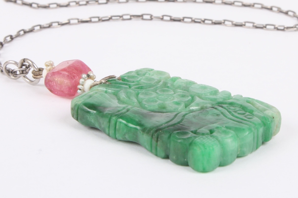 A Chinese jade pendant, of rectangular form carved on both sides with bamboo and flowers, the jade - Image 3 of 3