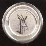 A 1973 Bernard Buffet silver plate decorated with a Gazelle, marked .925, in a fitted box with