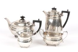 An Edward VII silver tea and coffee set, hallmarked London 1907, with makers mark for John Hunt,