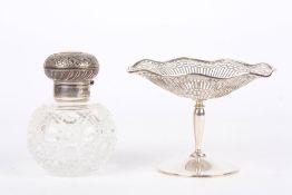 A silver topped perfume bottle, hallmarked London 1997, the bottle with hobnail design, together