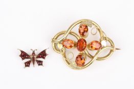 A Victorian garnet butterfly brooch, together with a large pinchbeck knotted brooch -2 . Fairly good