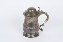 A George II silver tankard, hallmarked London 1751, with makers initials for Thomas Whipham, of