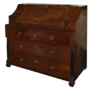 A Biedermeier walnut and crossbanded bureau, with three large drawers to the base, and two small