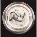 A 1977 Bernard Buffet silver plate decorated with a Rhinoceros, marked .925, in a fitted box with