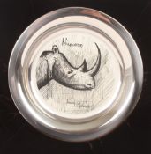 A 1977 Bernard Buffet silver plate decorated with a Rhinoceros, marked .925, in a fitted box with