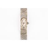 A ladies 9ct white gold Milner wrist watch, with bark effect strap and jewelled winder, the clasp