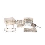 A collection of assorted silver, comprising a silver cigarette box, two trinket boxes, a tea