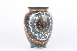 A 1950s Gouda Congola Royal black ground pottery vase, of ovoid form, painted with flowers in bright