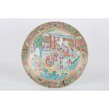 A large Chinese famille rose circular charger, circa 1900, decorated with a large central scene of