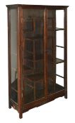 A Chinese hardwood display cabinet, with glazed doors opening to reveal display shelves, height