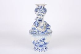 A 19th century Dutch tinglaze blue and white dragon vase, the body painted with a scene of a young