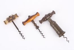 A collection of three 19th century corkscrews, including a Victorian brass patent Thomason style