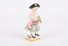 A 19th century Meissen porcelain figure of a young boy, holding a staff and wearing a colourful