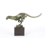 A contemporary Bronze Art Deco style running cheetah, with green patination and Parisian foundry
