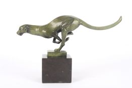 A contemporary Bronze Art Deco style running cheetah, with green patination and Parisian foundry