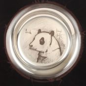A 1974 Bernard Buffet silver plate decorated with a Panda, marked .925, in a fitted box with