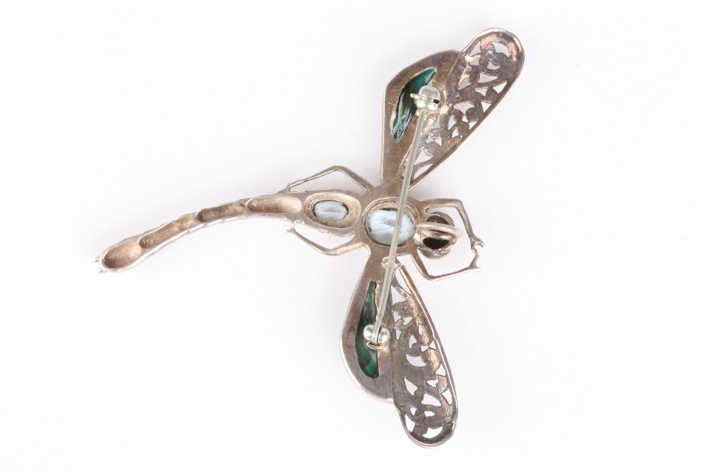 A Continental dragonfly brooch with abalone shell wings, and pale blue stone inset body, set in - Image 2 of 2