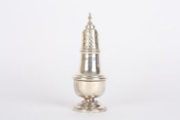 A silver baluster sugar sifterhallmarked Birmingham 1961, with pierced top and circular foot.