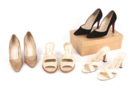 A collection of four pairs of designer shoes.including two pairs of Christian Louboutin shoes,