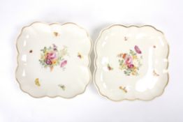 A pair of Swansea porcelain lozenge shaped dishespainted with a central spray of flowers surrounded