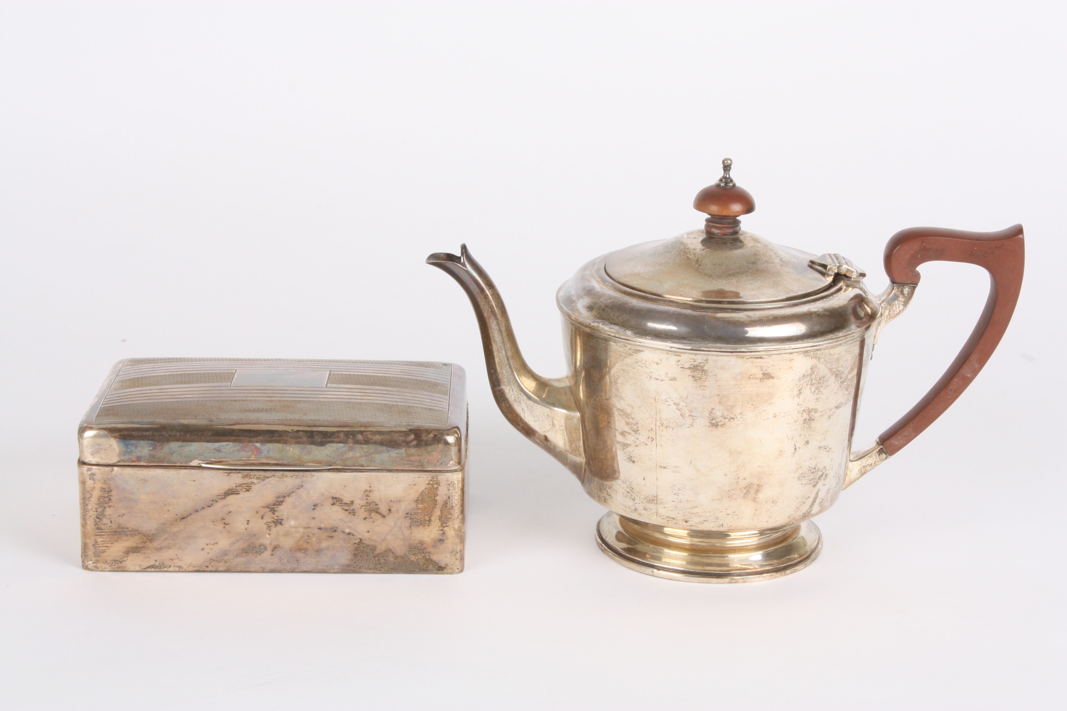 A Birmingham silver bachelors teapot
of tapered form with wooden knop, together with an engine