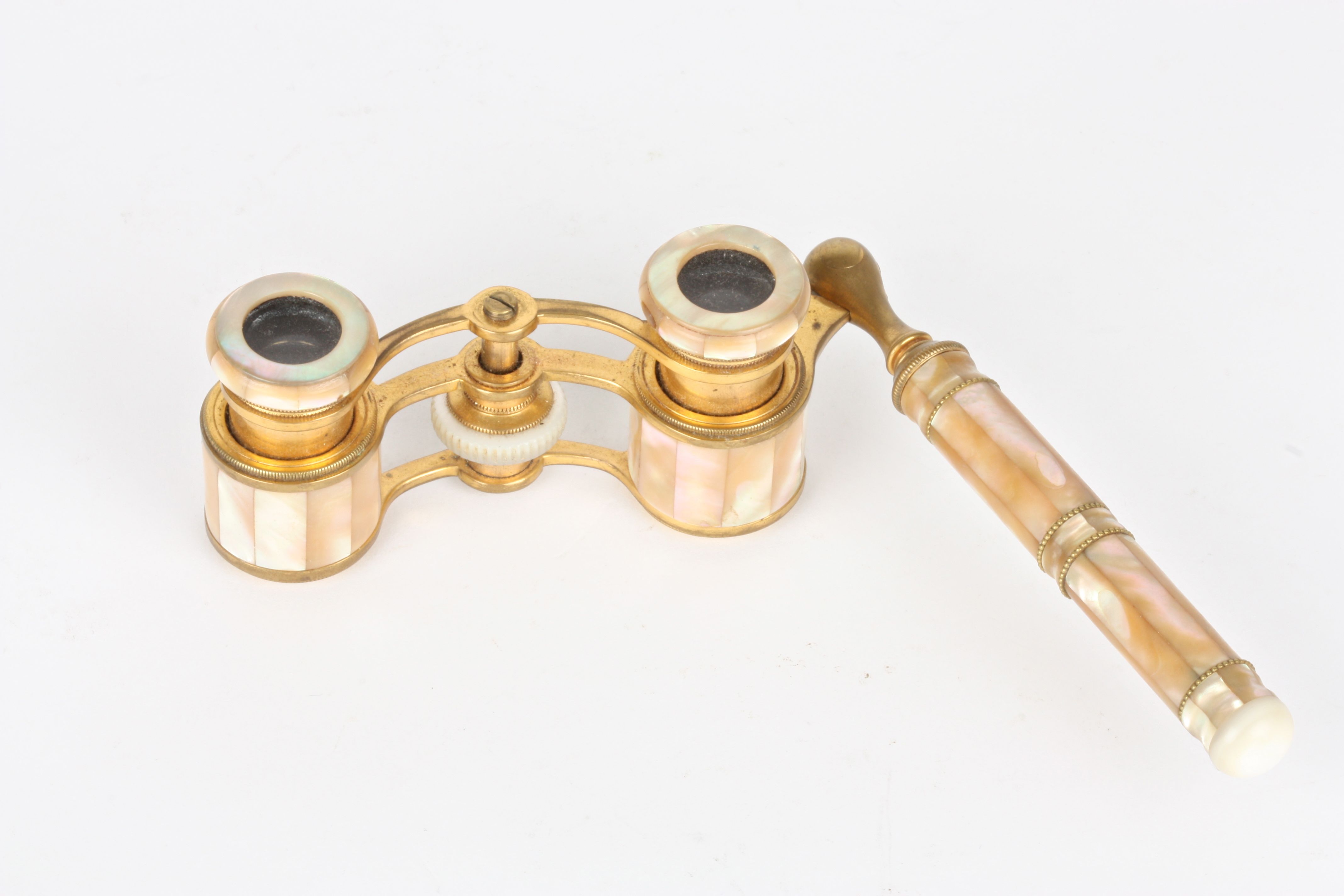 A pair of late 19th century French opera glasses
by Colmont of Paris, applied all over with