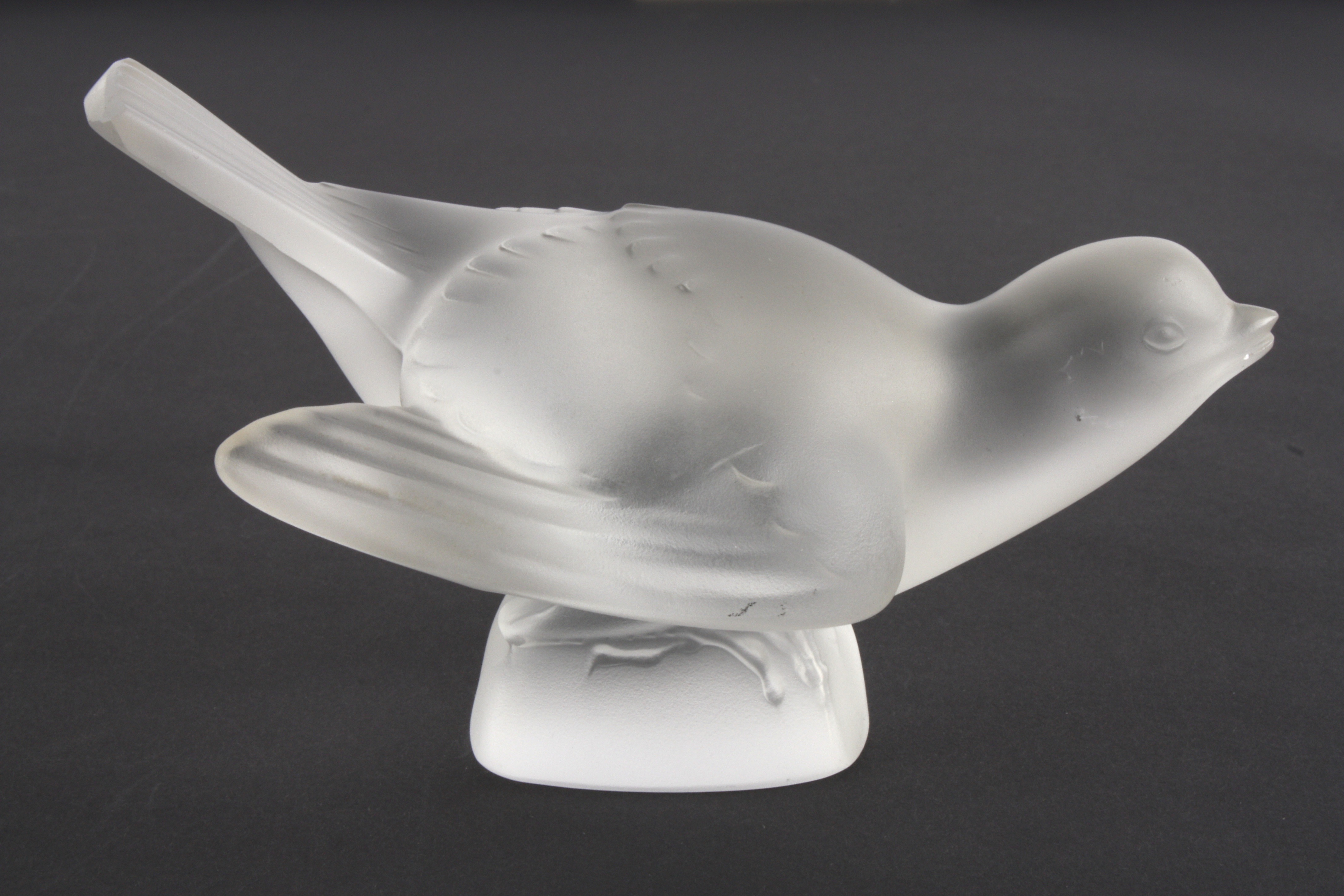 A Lalique frosted glass bird
in crouching pose with wings outswept. Etched signature to base ' - Image 2 of 5