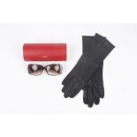 A pair of black leather ladies Dents gloves size 6.5.Dimensions: 31cm by 10cmCondition reportGood