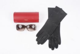 A pair of black leather ladies Dents gloves size 6.5.Dimensions: 31cm by 10cmCondition reportGood