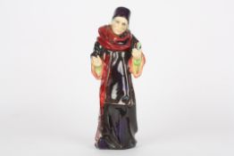 A Royal Doulton figure 'The Alchemist'HN1282Dimensions: height 29.5cmCondition reportRestoration to