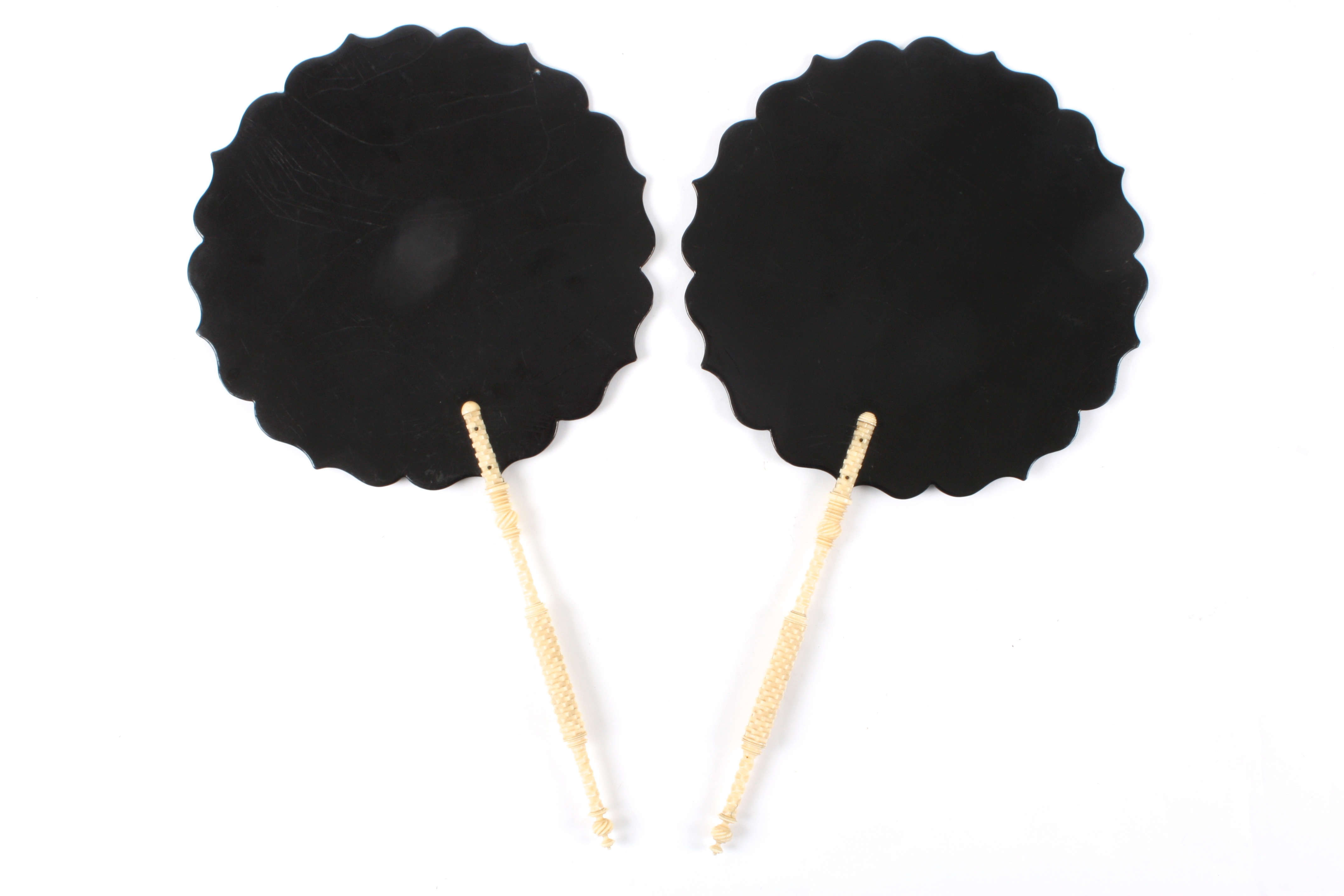 A pair of black lacquer Japanned fans
of shaped round paddle form decorated to the centre with - Image 2 of 2