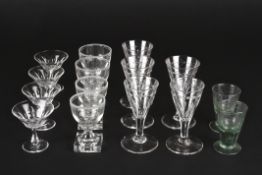 A group of assorted drinking glassesincluding five flower engraved cordial glasses, four small